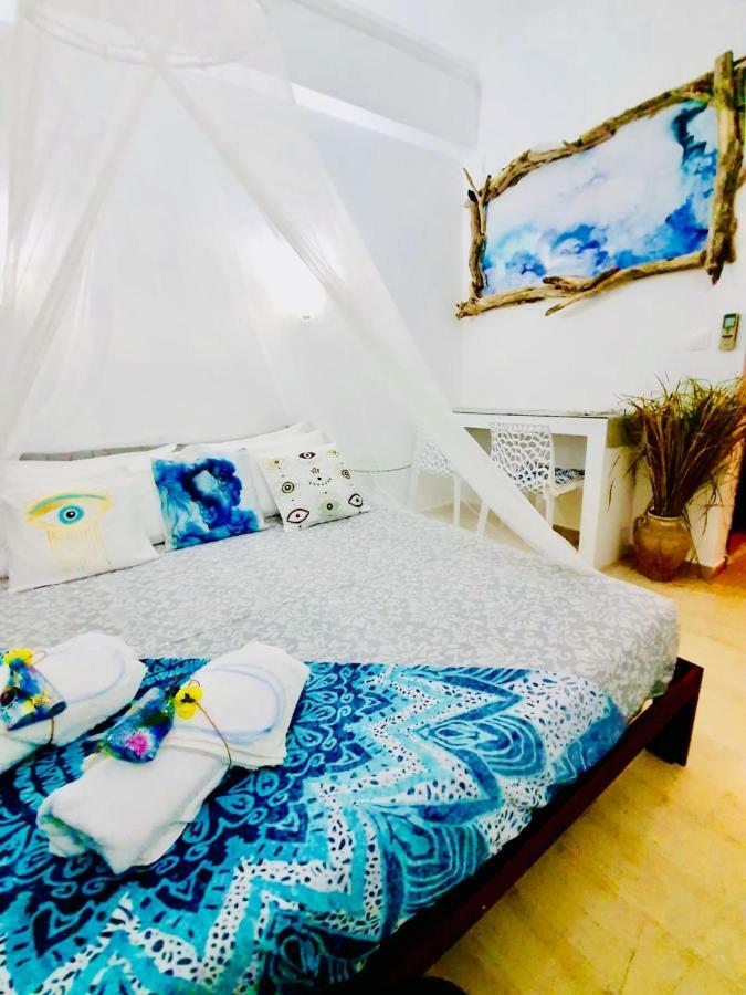 Thomas Art Hotel Pelekas Bagian luar foto
